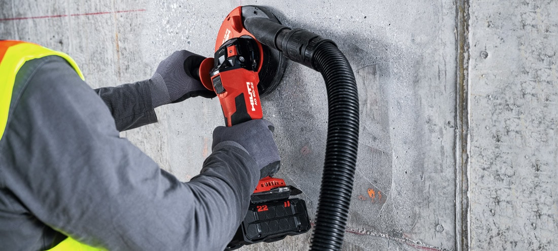 Meulage d'un mur béton avec une meuleuse Hilti